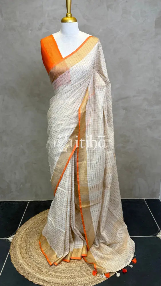 LINEN ZARI CHECKS ORANGE BORDER ONAM SAREE