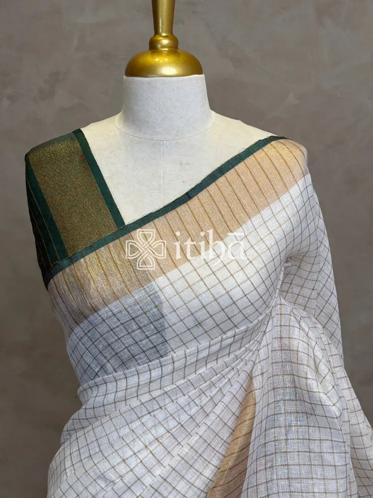 LINEN ZARI CHECKS GREEN BORDER ONAM SAREE