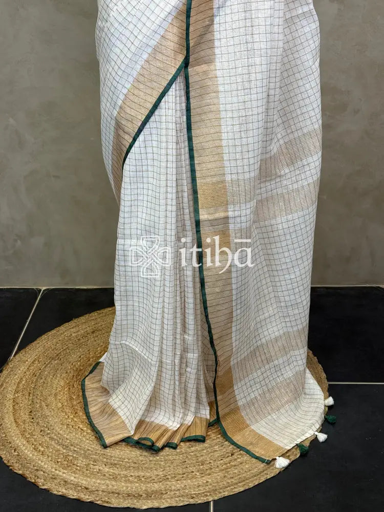 LINEN ZARI CHECKS GREEN BORDER ONAM SAREE