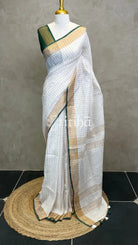 LINEN ZARI CHECKS GREEN BORDER ONAM SAREE