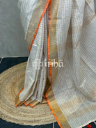LINEN ZARI CHECKS ORANGE BORDER ONAM SAREE