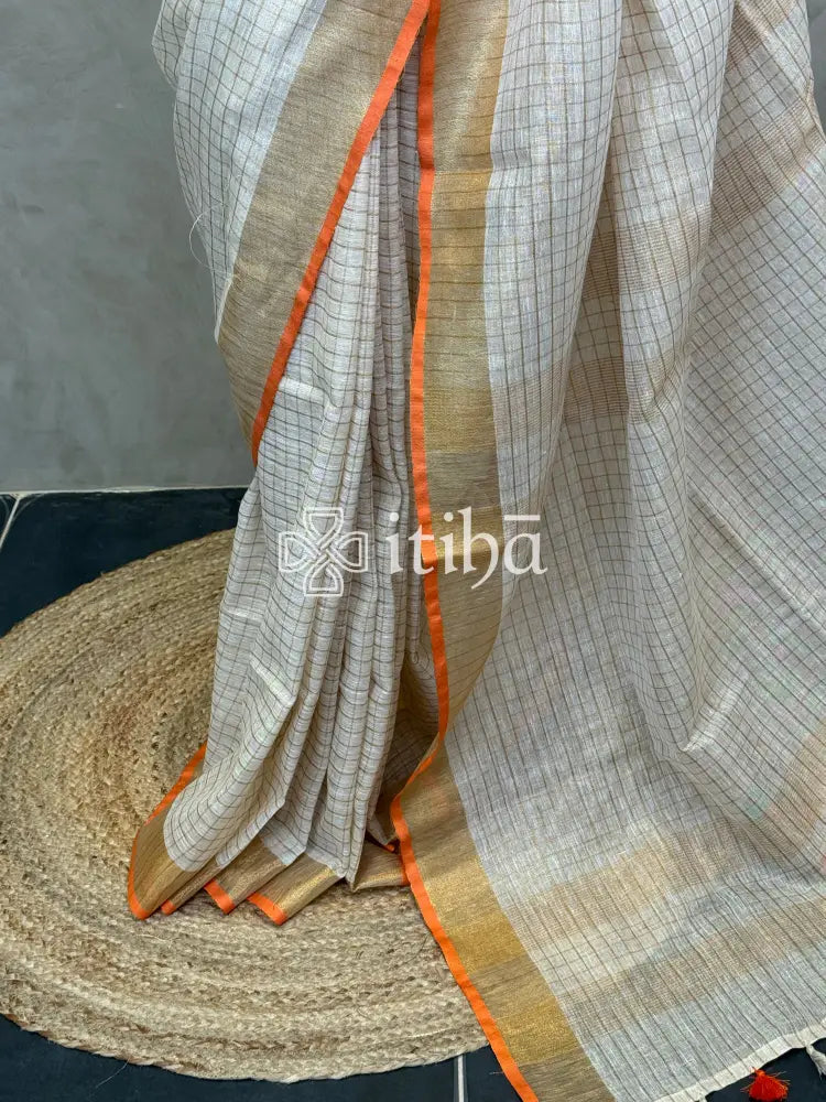 LINEN ZARI CHECKS ORANGE BORDER ONAM SAREE
