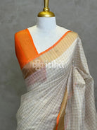 LINEN ZARI CHECKS ORANGE BORDER ONAM SAREE