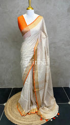 LINEN ZARI CHECKS ORANGE BORDER ONAM SAREE
