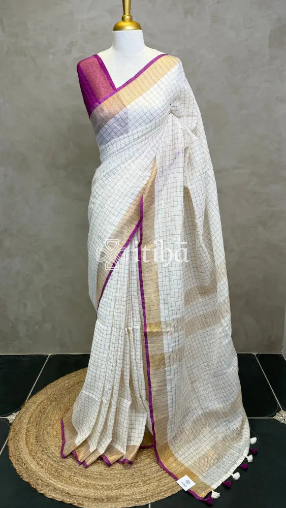 LINEN ZARI CHECKS PURPLE BORDER ONAM SAREE