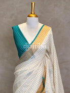 LINEN ZARI CHECKS TEAL GREEN BORDER ONAM SAREE