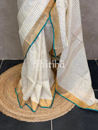 LINEN ZARI CHECKS TEAL GREEN BORDER ONAM SAREE